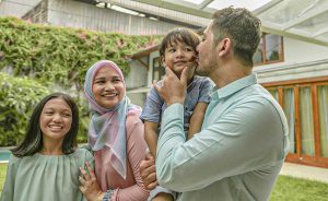 multi-generation family enjoying celebrating birthday